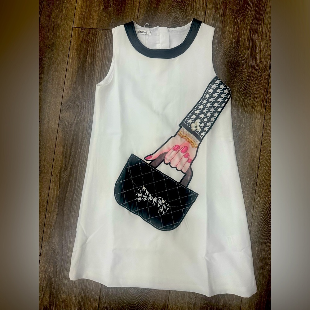 NWT kimo cat dress for 12 year old.